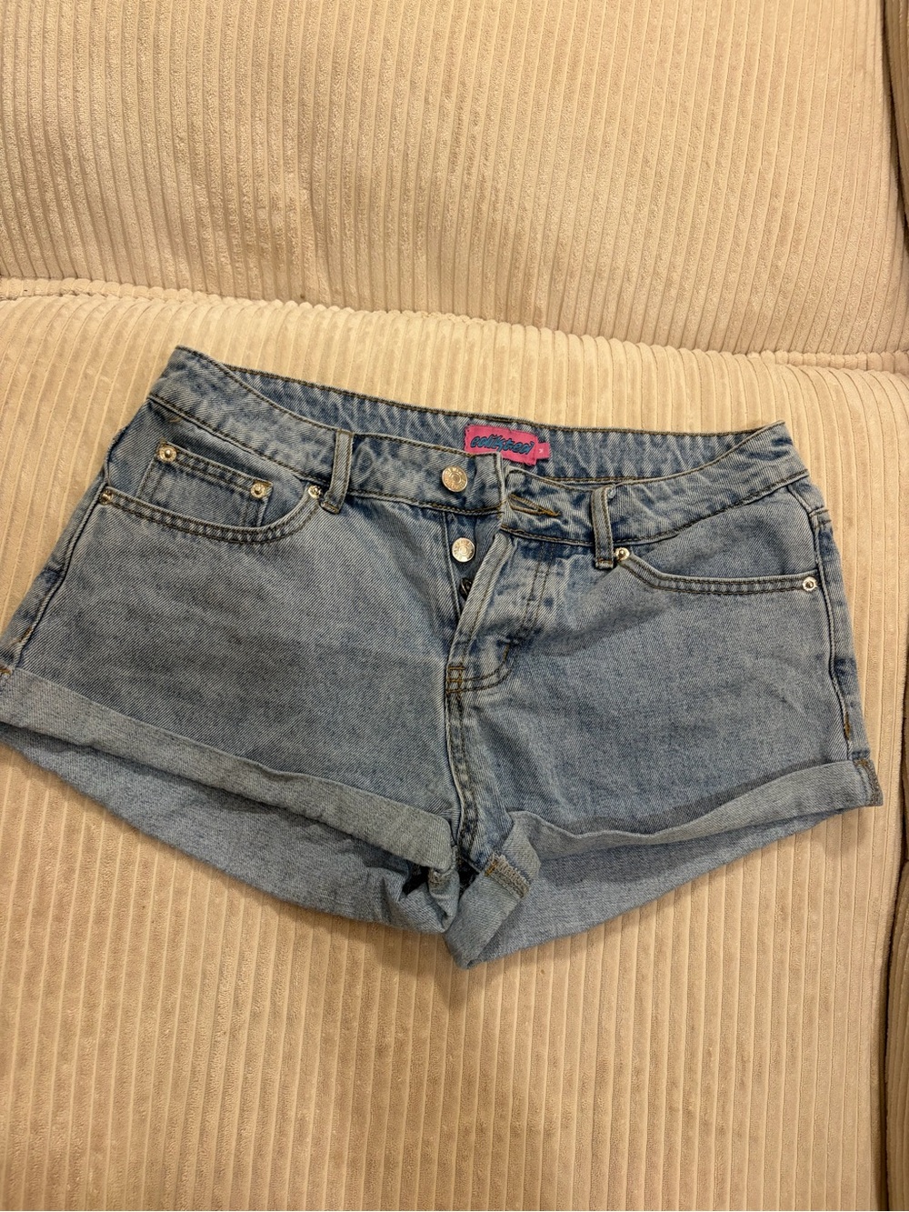 Edikted Light Blue Rolled-Hem Denim Shorts with branded buttons